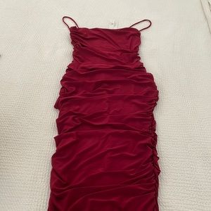 Windsor midi bodycon dress with ruched sides. Never been worn.